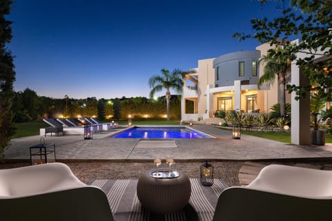 Property building, Seating area, Swimming pool
