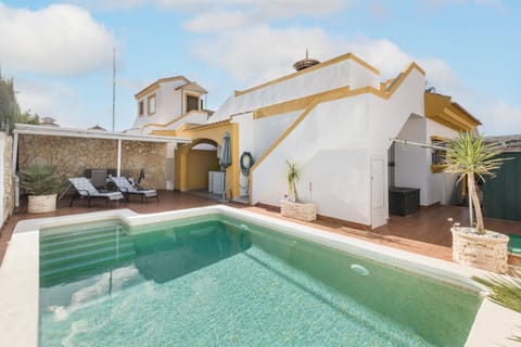 Property building, Living room, Swimming pool