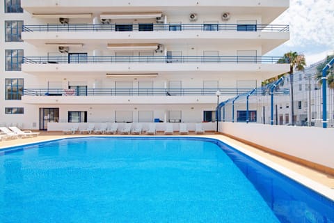 Property building, Living room, Swimming pool