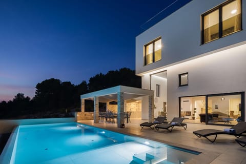 Patio, Night, Pool view, Swimming pool, Swimming pool, sunbed