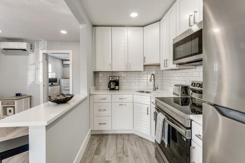 Walk to Gulf Madeira Beach Condo with Patio Apartment in Madeira Beach