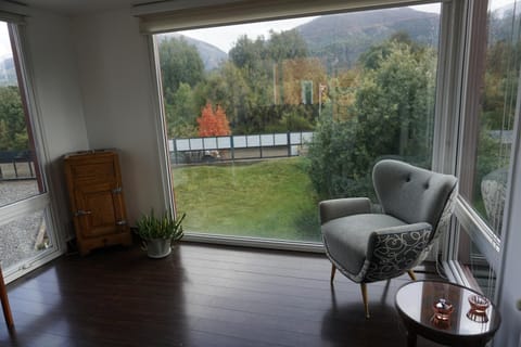 Living room, Seating area, Dining area, Garden view, Mountain view