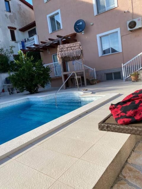 Property building, Day, Balcony/Terrace, Pool view, Swimming pool, sunbed