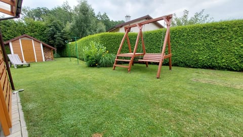 domek Drewniany na wiejskiej Campground/
RV Resort in Pomeranian Voivodeship