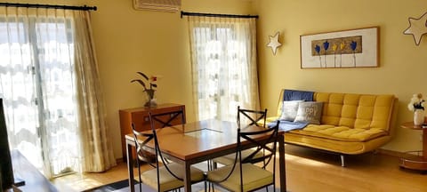 Living room, Seating area, Dining area, air conditioner