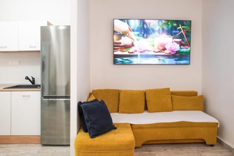 Communal lounge/ TV room, TV and multimedia, Kitchen or kitchenette, Living room, Seating area, Evening entertainment, minibar, oven