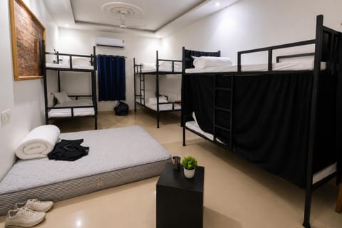 bunk bed, towels, air conditioner