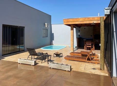 Property building, Pool view, Swimming pool, sunbed