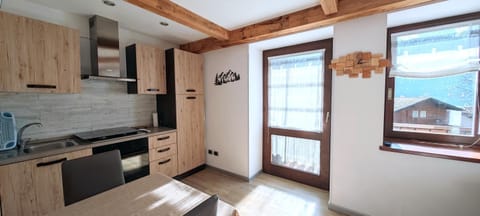 Kitchen or kitchenette, oven, stove