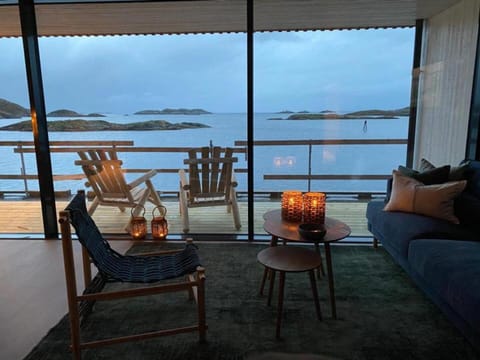 View (from property/room), Balcony/Terrace, Living room, Seating area, Mountain view, Sea view