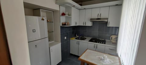 Kitchen or kitchenette, oven, stove