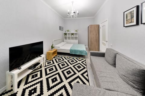 Bed, TV and multimedia, Living room, Photo of the whole room, Seating area