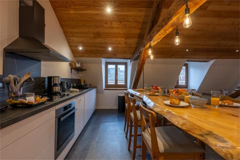 Dining area, dishwasher, oven, stove, toaster, kitchen
