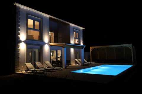 Property building, Night, Swimming pool