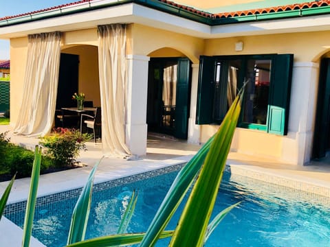 Property building, Patio, Swimming pool
