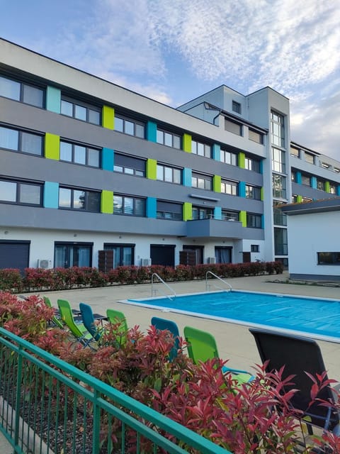 Property building, Swimming pool, Swimming pool, sunbed