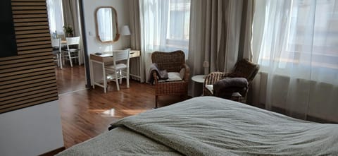 Bed, Seating area, Bedroom