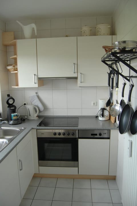 Kitchen or kitchenette, dishwasher, oven, stove, toaster