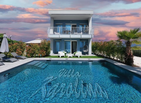 Property building, Pool view, Swimming pool, sunbed