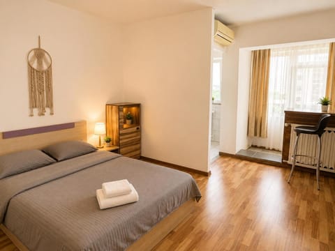 Bed, Photo of the whole room, Bedroom, towels, air conditioner