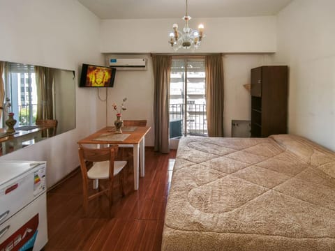Bed, TV and multimedia, Living room, Photo of the whole room, Seating area, Dining area, Bedroom, wardrobe, air conditioner