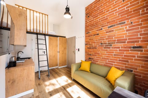 Kitchen or kitchenette, Living room, Seating area, Dining area