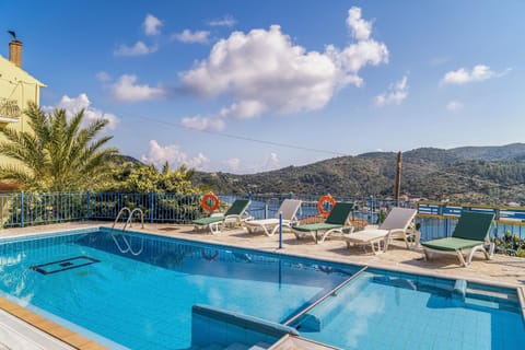 Property building, Living room, Swimming pool
