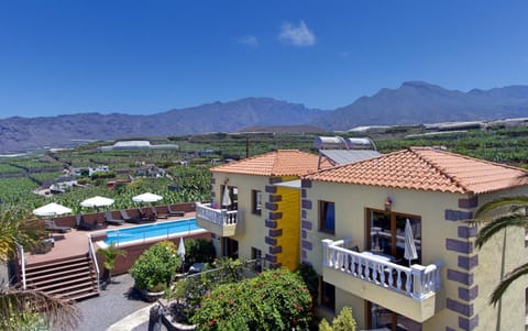 Property building, View (from property/room), Mountain view, Swimming pool