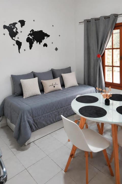 Bed, Living room, Seating area, Dining area