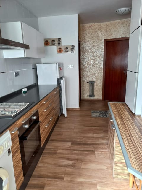 Kitchen or kitchenette, oven