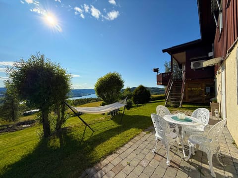 Patio, Day, Natural landscape, Garden, Seating area, Dining area, Garden view, Lake view, Sea view, sunbed