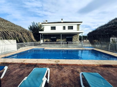 Property building, Living room, Swimming pool