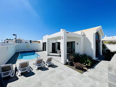 Property building, Living room, Swimming pool