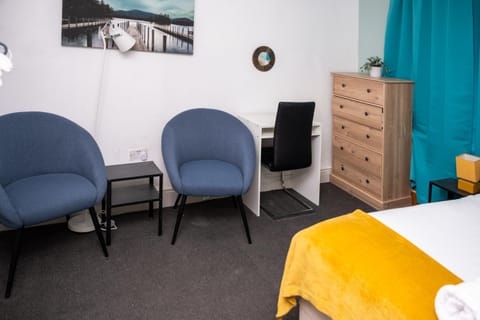 Bed, Seating area, Bedroom