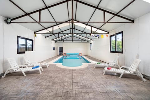 Property building, Living room, Swimming pool