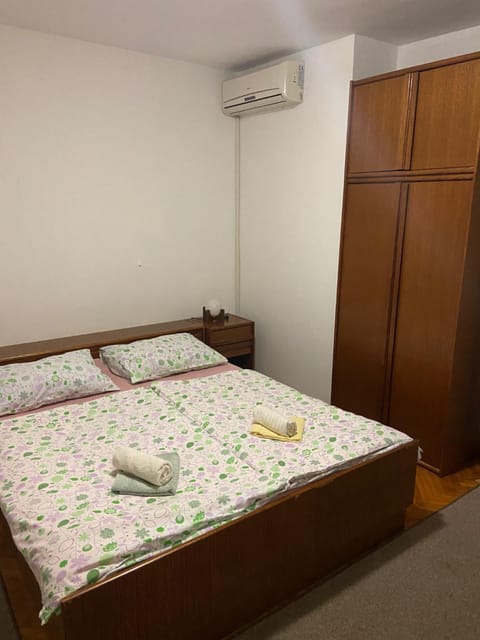 Bed, wardrobe, air conditioner