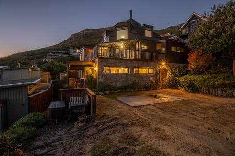 Property building, Patio, Facade/entrance, Night, Natural landscape, Balcony/Terrace, Mountain view, Parking