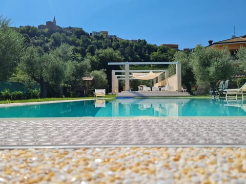 Property building, Natural landscape, Mountain view, Pool view, Swimming pool, sunbed