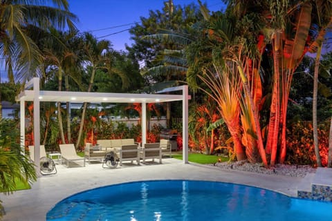 VillaLee-Jungle Palm Island white marble pool Area House in Golden Glades