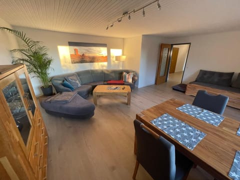 Bed, Living room, Seating area, Dining area
