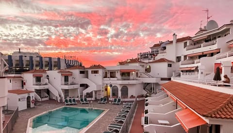 Property building, Swimming pool, Sunset, sunbed
