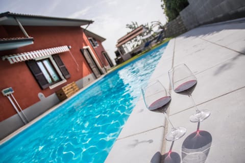 Property building, Patio, Day, Pool view, Swimming pool, sunbed