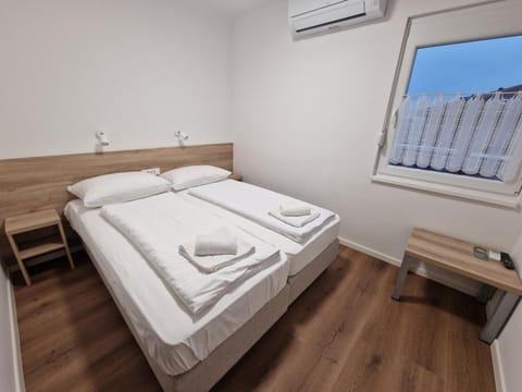 Bed, View (from property/room), Bedroom, towels, air conditioner