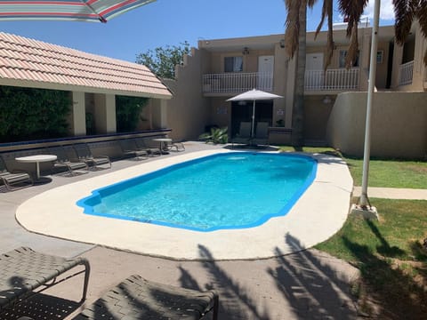 Property building, Patio, Day, Pool view, Swimming pool