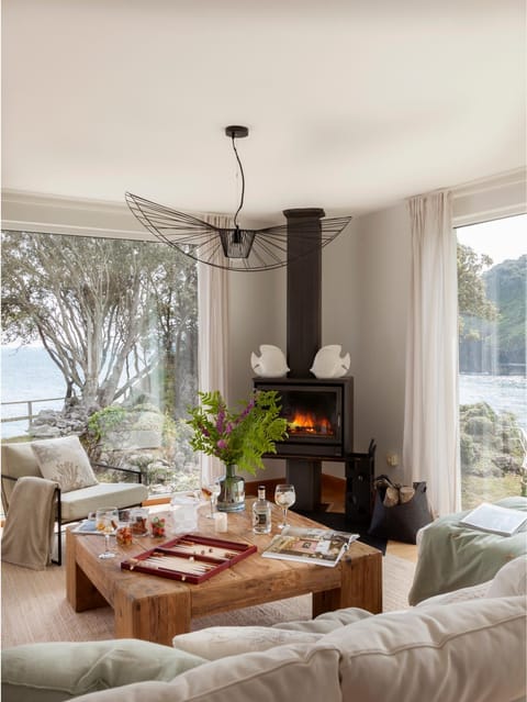 Natural landscape, Living room, Seating area, Sea view, fireplace