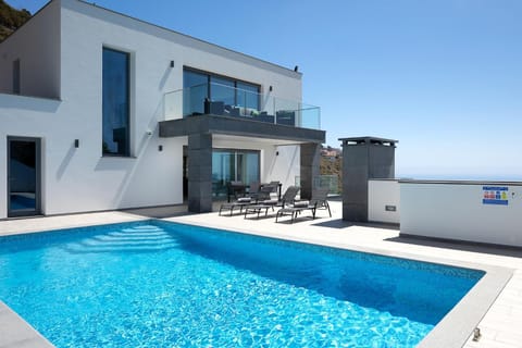 Property building, Patio, View (from property/room), Balcony/Terrace, Swimming pool, sunbed
