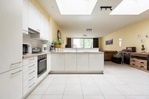 Kitchen or kitchenette, dishwasher, oven, stove