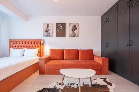 Bed, Living room, Seating area
