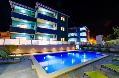 Property building, Night, Swimming pool