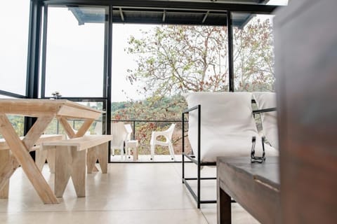 View (from property/room), Living room, Seating area, Dining area